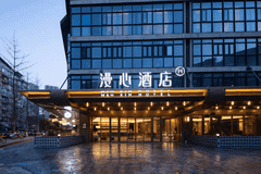 两家品牌酒店，头一次开进了西村大院