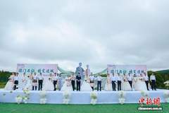 “雪城”牡丹江：集体婚礼倡新风 边城七夕情意浓