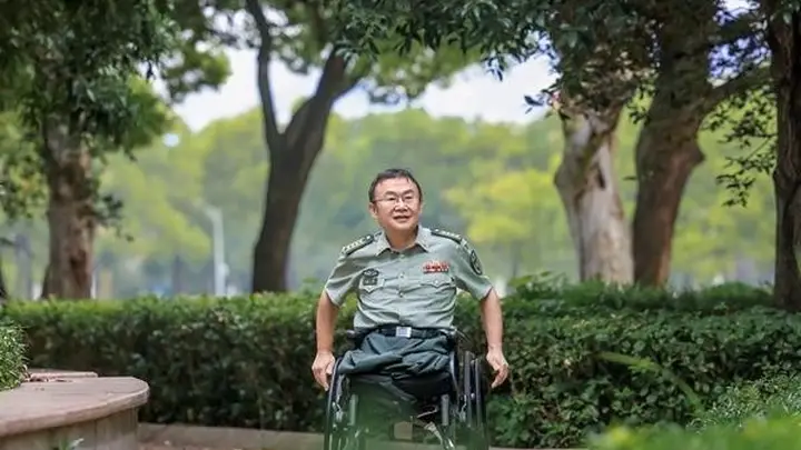 轮椅上的科技尖兵王戟 攻克关键技术成果获学界高度认可